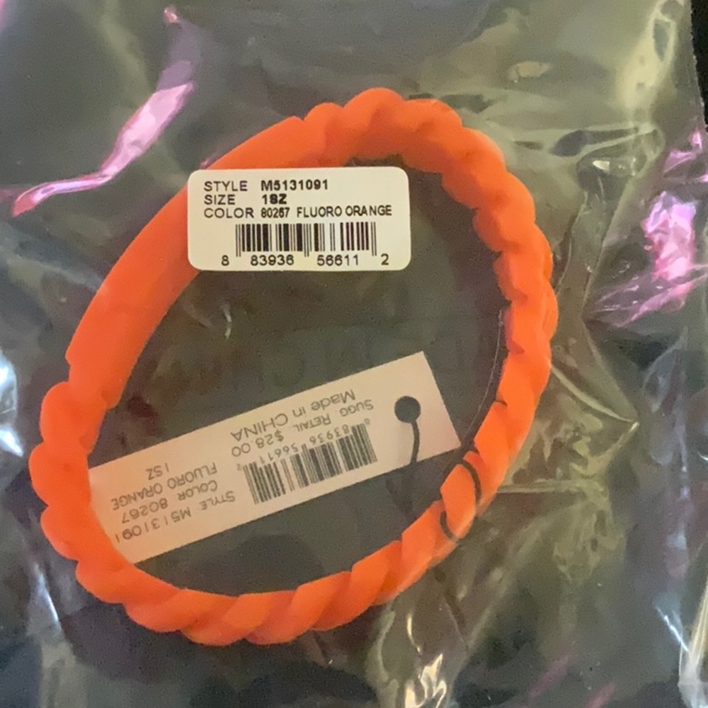 Marc Jacob’s Fluoro Orange Twisted Bracelet